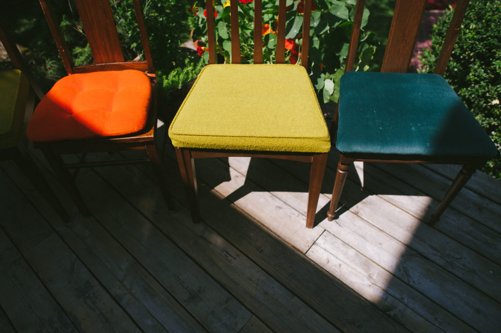 backyard abbotsford wedding colourful vintage wedding chairs